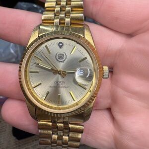 Vintage Reliance by Croton Gold Tone Watch Date Diamond Accent Japan Quartz Mens